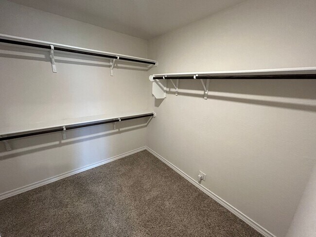 Building Photo - *COMING SOON* 3-Bedroom with Solar Panels & Resort Amenities – Pool, Gym!