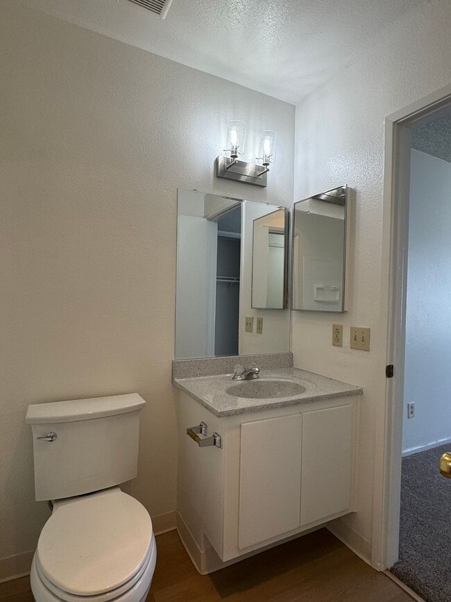 Building Photo - Upstairs two-bedroom 1/12 bath condo avail...