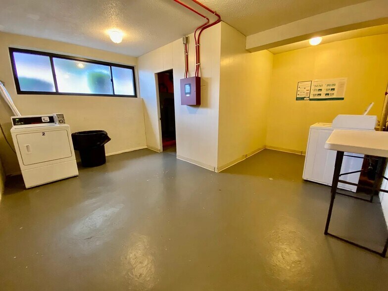 Laundry on the floor. - 20 School Ave