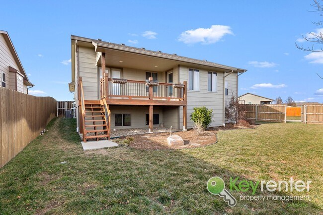 Building Photo - Spacious 4-Bedroom Home with Finished Basement & 3-Car Garage – Derby, KS