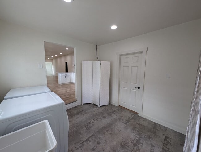 Building Photo - Adorable Four Bedroom w/ Fenced Yard Avail...