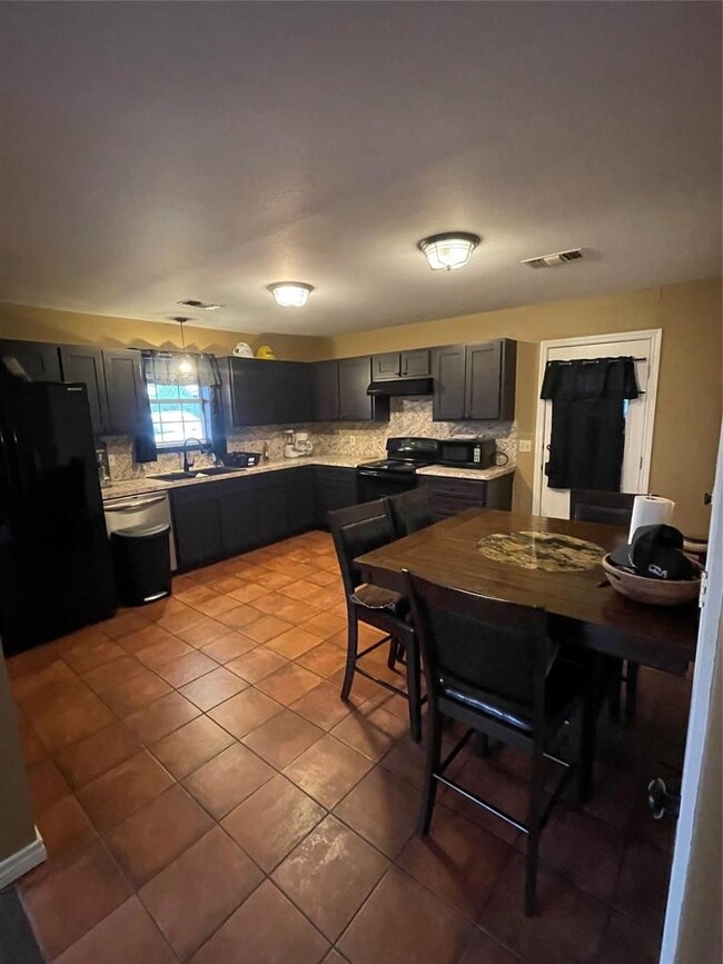 Building Photo - 940 E Guadalupe St