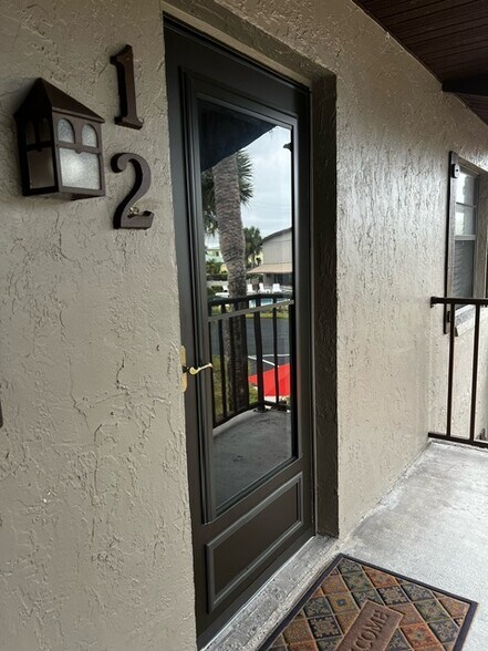 front door - 927 Capri Isles Blvd