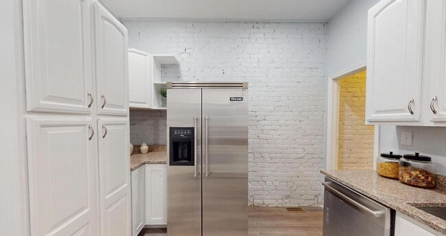 Building Photo - Extraordinary Columbia Heights Opportunity | Spacious 5BR + 2 Den Home with Off-Street Parking