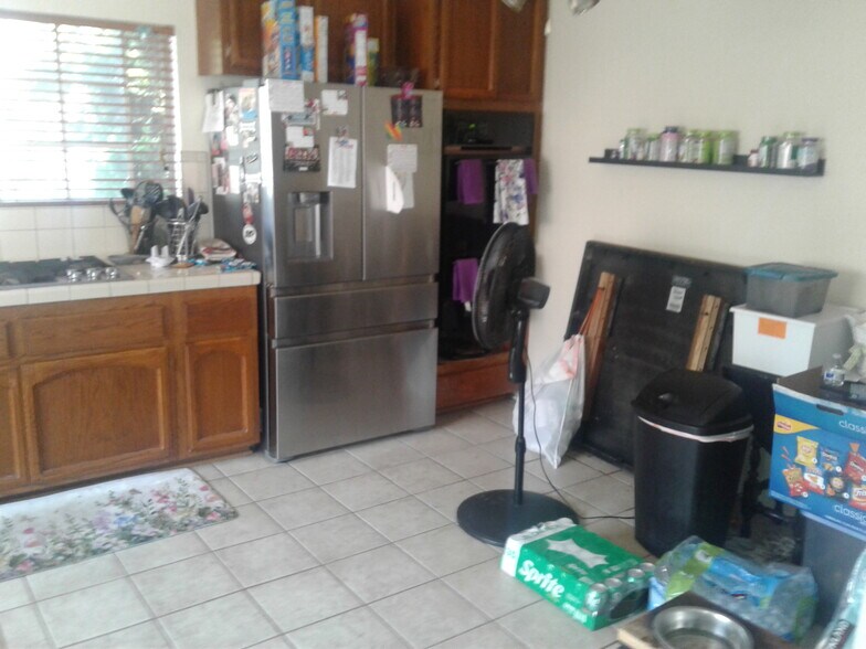 KITCHEN-TILE FLOOR-NEW STAINLESS FRENCH DOOR REFRIGERATOR - 2106 Clark Ln