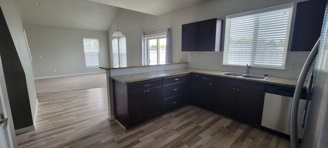 Building Photo - "Luxury Living: Stunning End Unit Townhome...