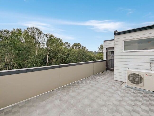 Building Photo - Stunning Two-Bedroom Townhome with Rooftop...