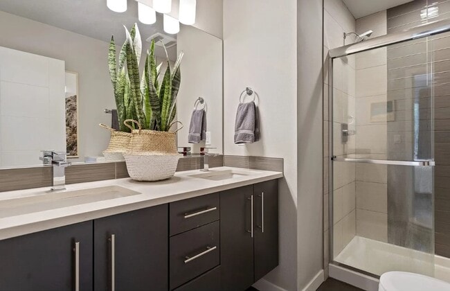 Building Photo - Dual Masters! Stunning Modern End-Unit Townhome in Buckman Bright, Airy & Designed for Comfort