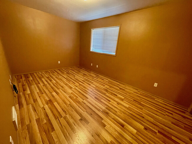 Bedroom 1 facing looking into the room from the door - 290 NW Clay Ct