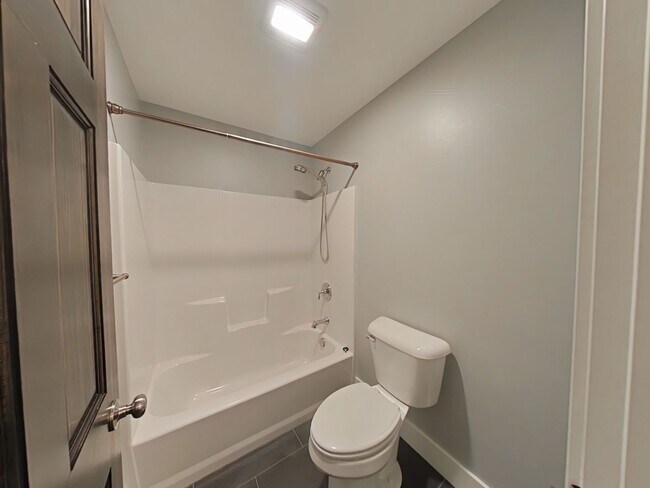 Building Photo - Stunning 3-bedroom, 2.5-bathroom condo with attached 2 stall garage!