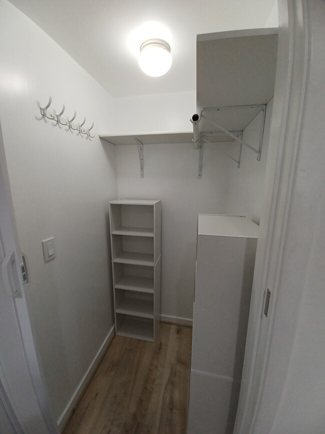 Walk-in closet. - 3125 Curts Ave