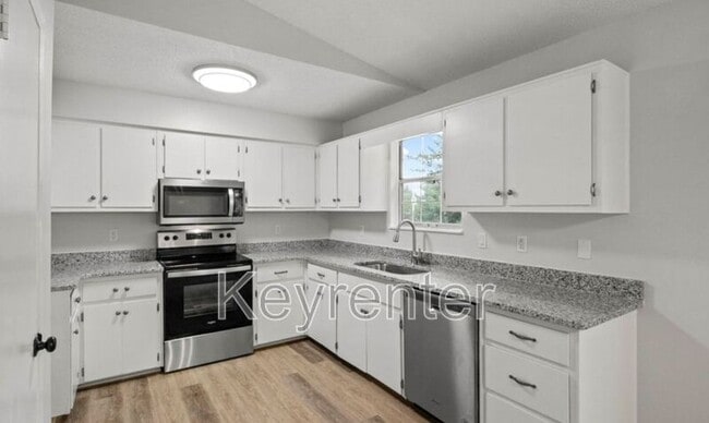 Building Photo - 6600 Woodcock Cir