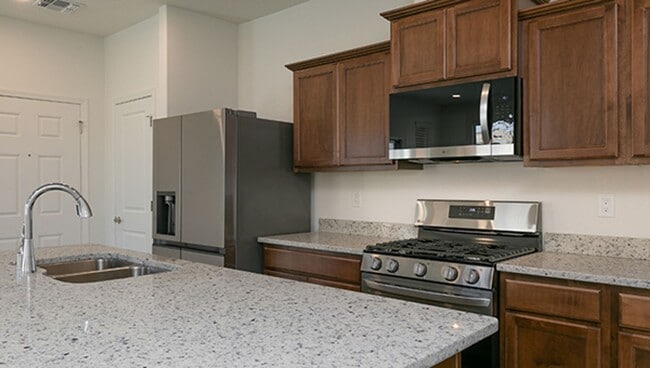 Building Photo - New ST FE Town Home