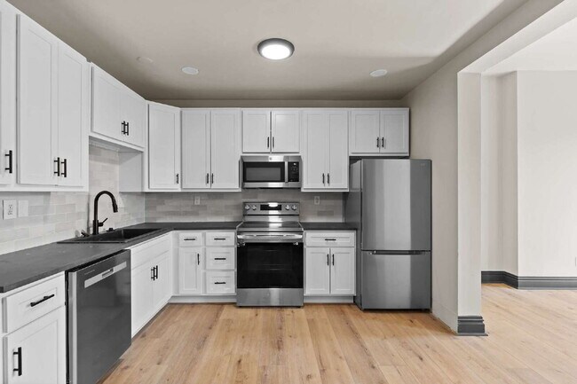 Building Photo - For Rent: Renovated 2-Story Townhouse in M...