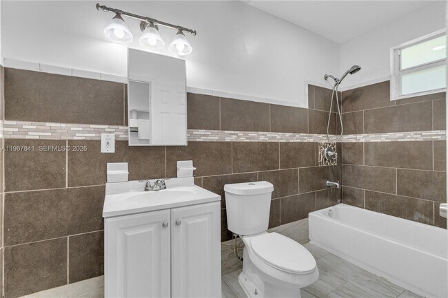 Building Photo - 6940 NW 6th Ct