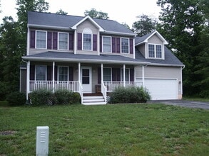 Building Photo - COMING SOON- 4 bed 2.5 bath single family home
