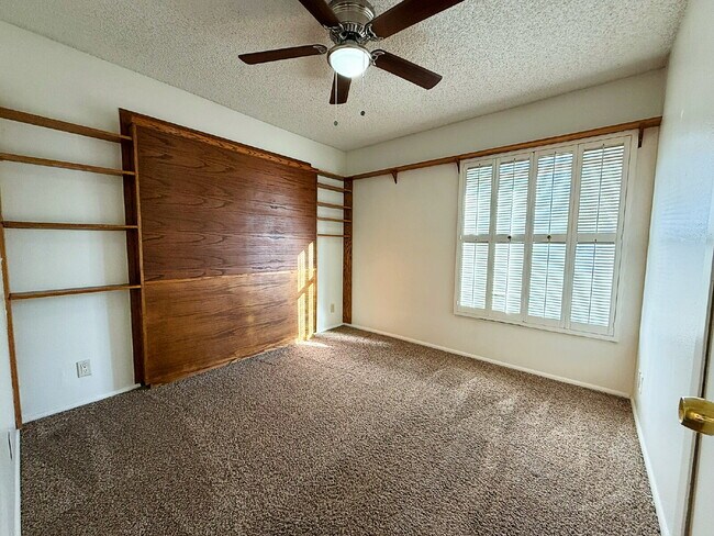 Building Photo - "Charming 3-Bedroom Oasis in Goodyear - Sp...