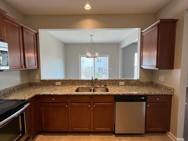 Building Photo - **OFFERING REFUNDABLE APPLICATION FEES** Fantastic 3BD, 2.5BA North Raleigh Townhome with Fenced ...