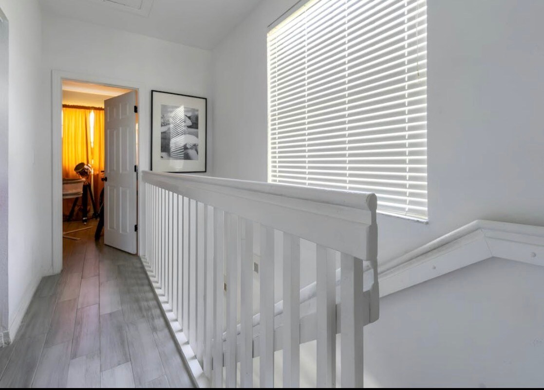 Large windows throughout / linen closet - 705 SW 148th Ave