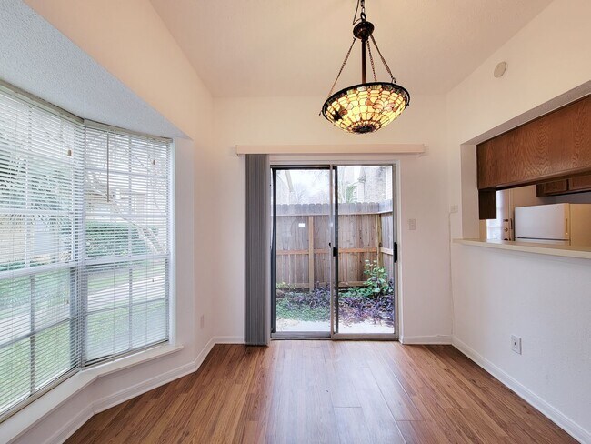 Building Photo - Beautiful two-story corner unit filled with natural light!