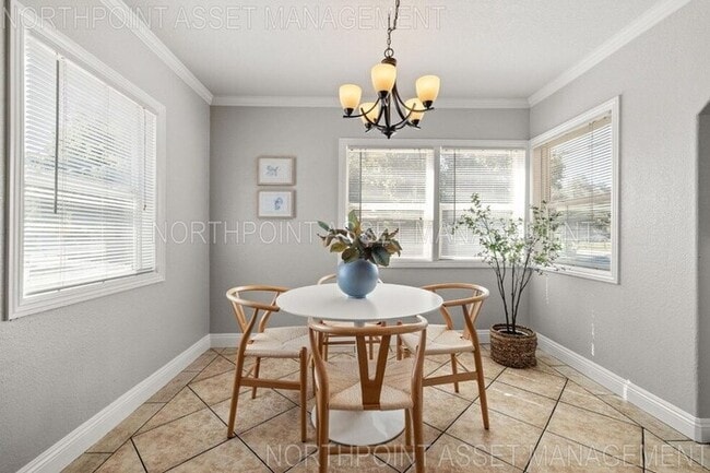 Building Photo - Welcome to this stunning 4-bedroom, 2-bath...