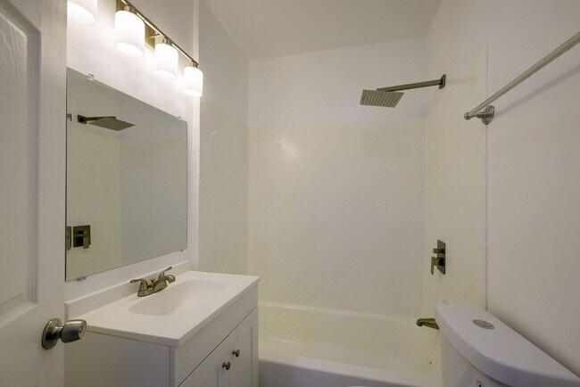 Building Photo - Charming & Renovated Petworth Rowhouse with Parking -  Available Now!