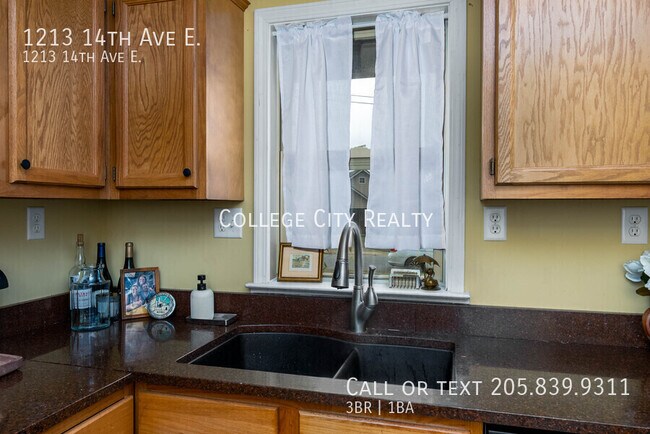 Building Photo - 1213 14th E Ave