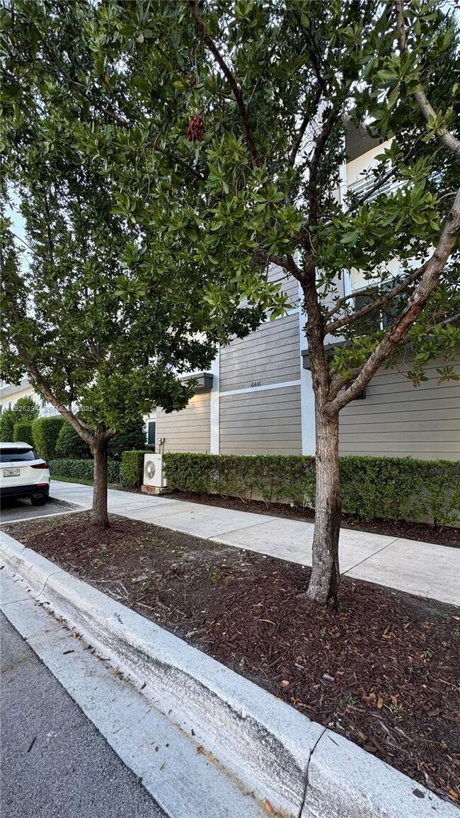 Building Photo - 6416 NW 102nd Ct