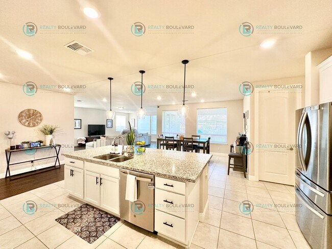 Building Photo - Welcome to your dream home, where modern elegance meets unparalleled convenience!