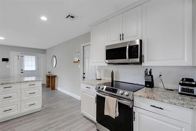 Building Photo - 3857 Woodrow Ridge St