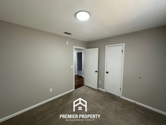 Building Photo - Spacious 4BR/2BA Home in 38141 | Vinyl Flooring & Large Fenced Backyard