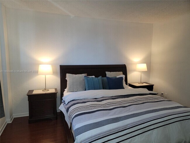 Building Photo - 19380 Collins Ave