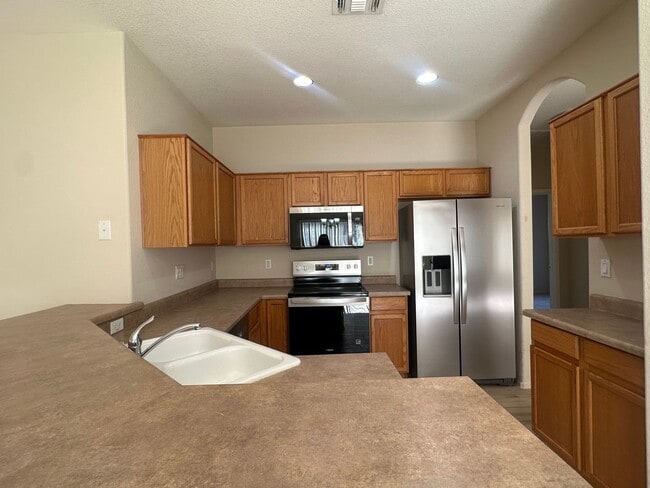 Building Photo - SAN TAN RANCH SINGLE LEVEL 4 BEDROOM WITH NEW FLOORING THROUGHOUT