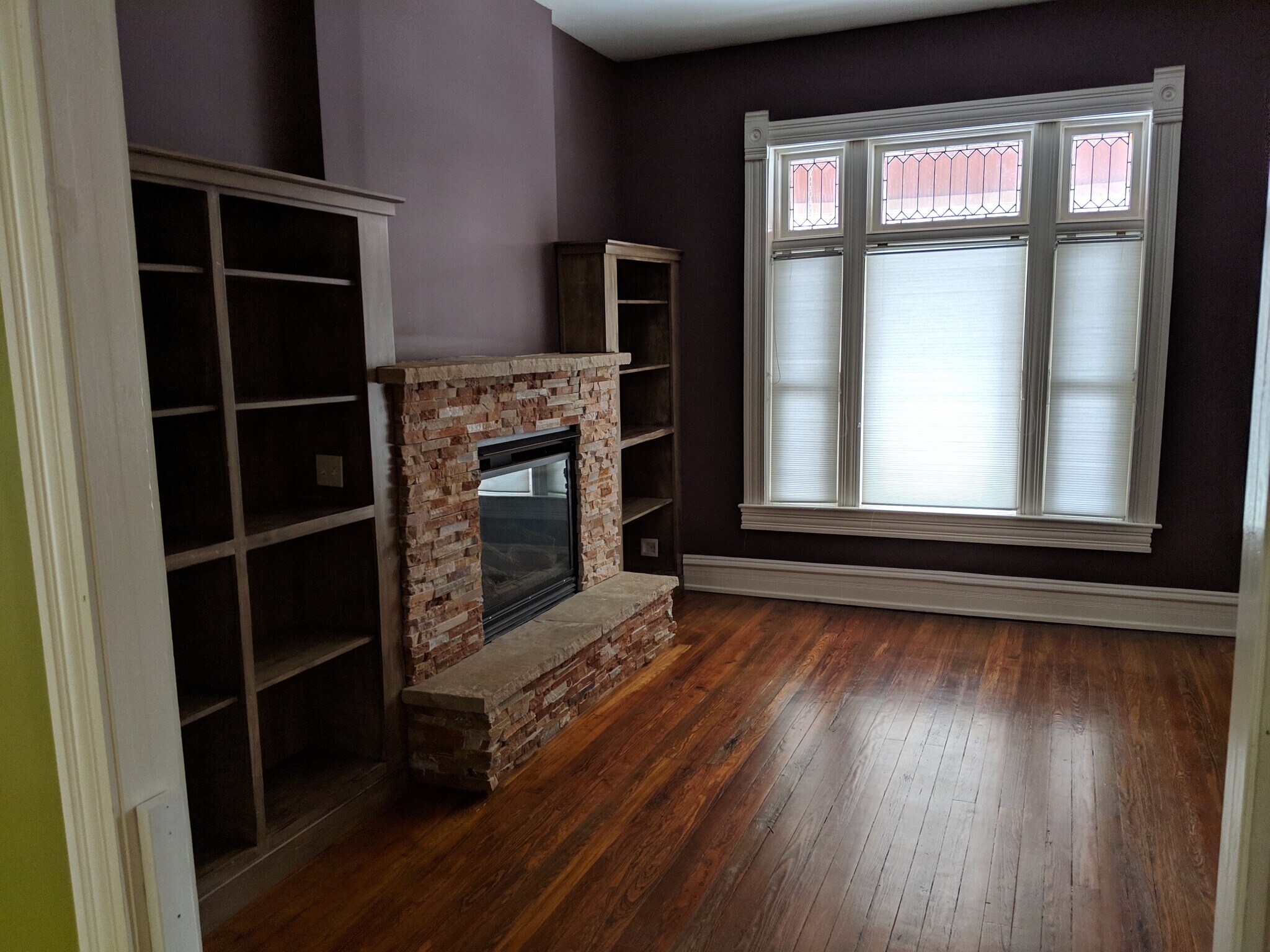Fireplace Room with bookshelves - 2860 Humboldt St