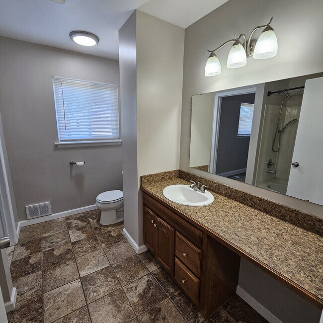 Building Photo - Updated 2 Bedroom Ranch with Open Living Room that Flows Through Kitchen, Dining Area to Great Ro...