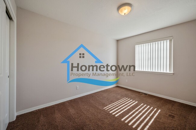 Building Photo - 3 Bedroom, 2 Bathroom Home, with Attached ...