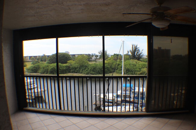 Building Photo - 2/2 Condo with Marina and River Views-Includes cable and water