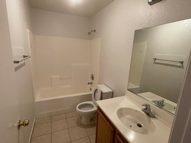 Building Photo - Adelanto Home-3 Bedrooms,2 Bathrooms, Laminate Floors, Indoor Laundry Room, Large Back Yard