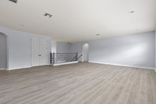 Building Photo - Spacious 6-Bedroom Home Near Lake Nona | 3-Car Garage + Tesla Charger