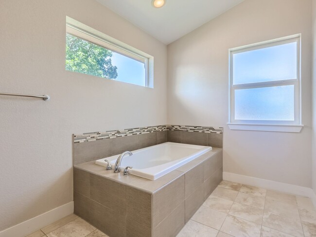 Building Photo - COMING IN  May!!!!!!  Spacious 4 Bedroom, ...