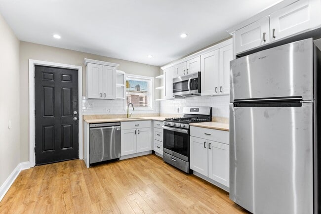 Building Photo - Parkside Haven: Contemporary 2-Bedroom Row Home Near Patterson Park