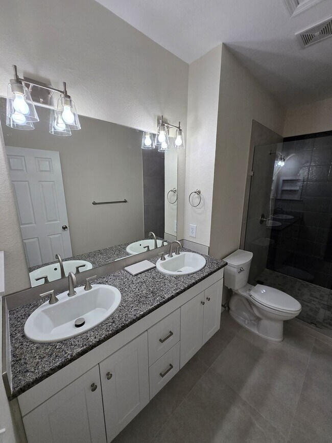 Building Photo - 1 Bed / 1.5 Bath – Magnolia Place