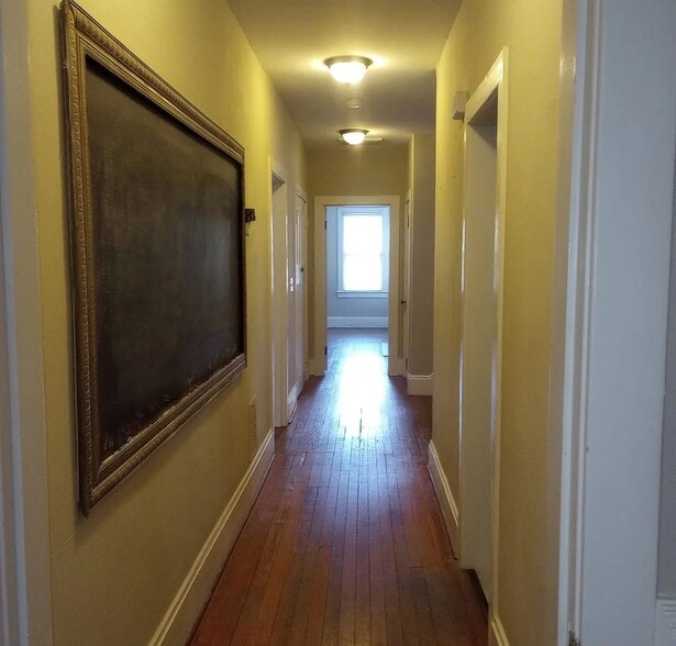 Walkway between bedroom #2 and kitchen, at end of hallway is bedroom #1 - 816 Westover Ave