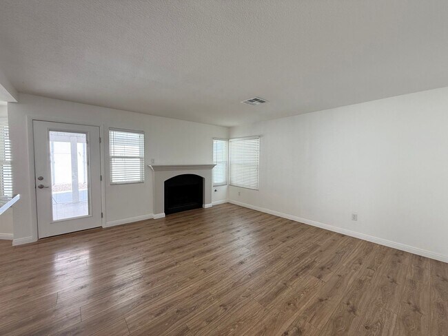 Building Photo - Corner Lot Beauty with Open Living, Guest Suite Down & Expansive Backyard
