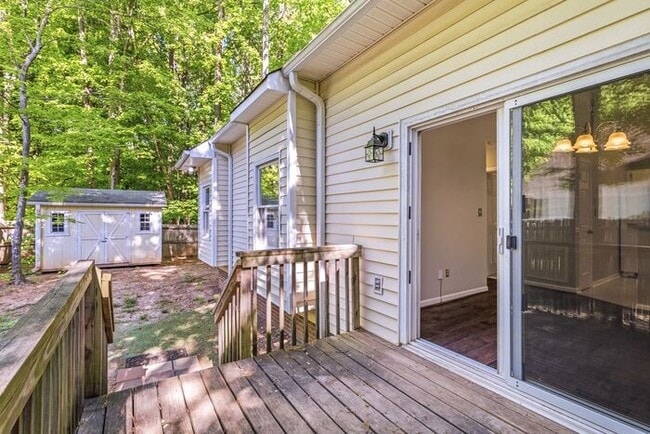 Building Photo - NW - Updated Home with Granite Counter-tops, Fire Place, Deck, Storage Building, Garage!