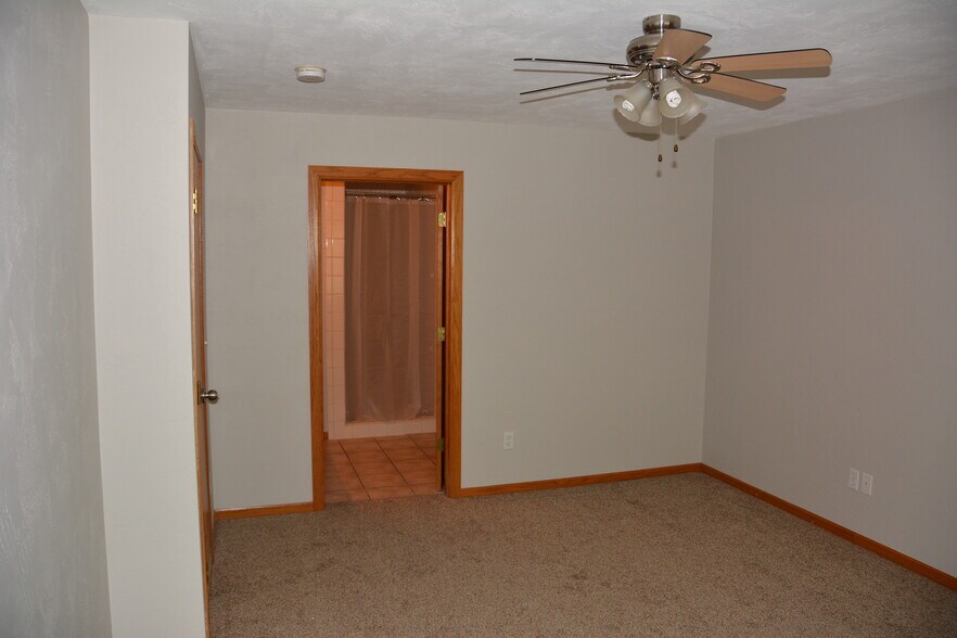 En suite with deep walk-in closet. - 325 Cordy Lane