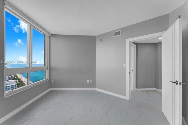 Building Photo - 6365 Collins Ave