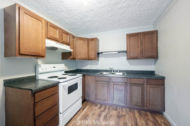 Building Photo - "Cozy 1-Bedroom Oasis in Greenfield – Perf...