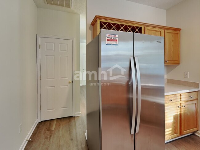 Building Photo - 5202 Carriage Woods Dr