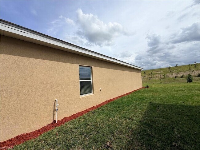 Building Photo - 3917 Passion Vine Dr